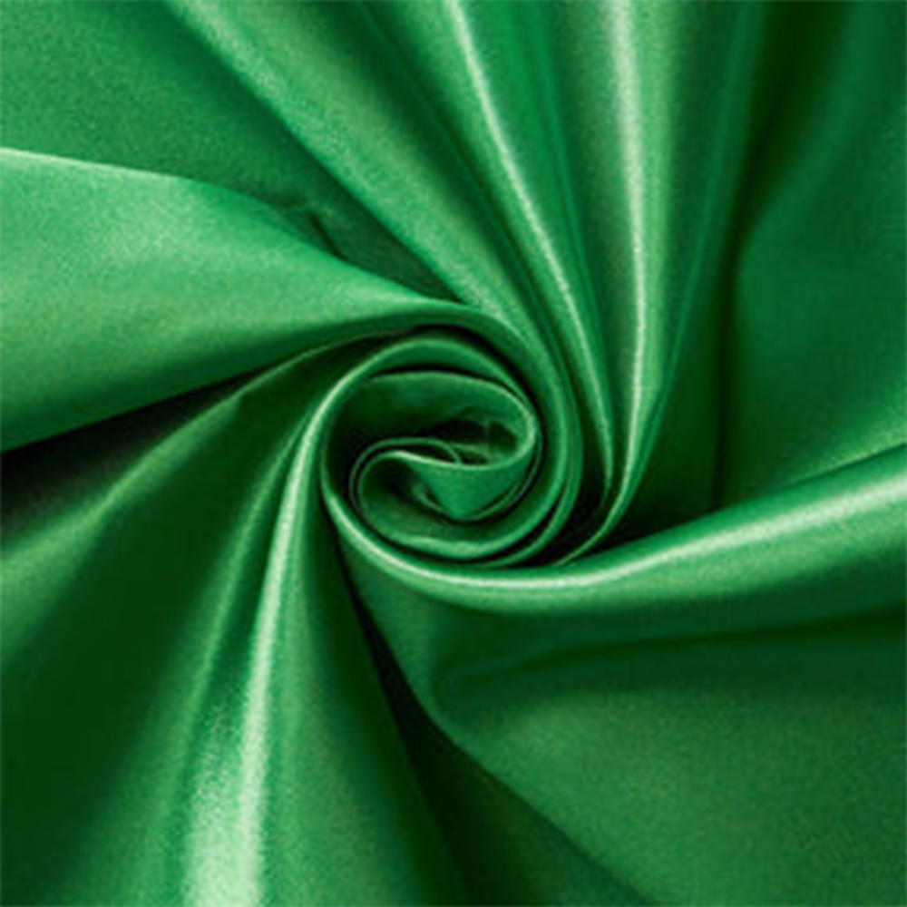 Lush emerald, green bridal satin fabric sold by beautifulwindowselgin.com