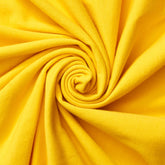 Close-up of yellow fabric in a swirl pattern |Order online at BeautifulWindowsElgin.com