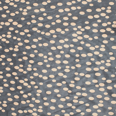 A yard of Cadiz Oval Spotted Printed Silk Chiffon in black color with an oval spotted pattern.