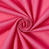 Close-up of pink fabric with a swirl pattern