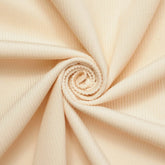 Off-White—Standard 9 WaleCorduroy Material—0.75 Millimeters Thick—100% Cotton—59-60"Inch Wide—15.3 Ounces—Sold by the Yard