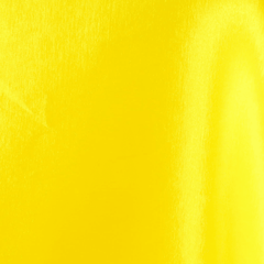 A close-up image of a yellow stretch taffeta fabric with a smooth texture and a subtle lustrous sheen| Shop online at BeautifulWindowsElgin.com