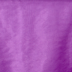 Sheer and sparkling—Purple Tint— Organza Fabric—Composition: 55% Nylon, 45% Polyester—Width 57/58 Inches Wide—Sold by the Yard— Nationwide Shipping Available..
