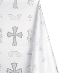 White fabric with black embroidered cross patterns on a white background