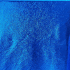 Close-up of a royal blue metallic stretch foil lame fabric with a — Beautiful Windows Elgin reflective finish.