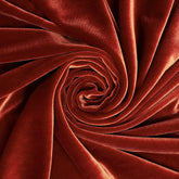 Close-up of red velvet fabric in a swirl pattern |Shop online at BeautifulWindowsElgin.com