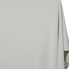 Light gray fabric with a draped edge on a white background| sold by beautifulwindowselgin.com