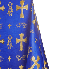 Blue fabric with gold crosses and decorative patterns
