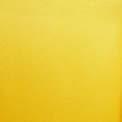 A swatch of neon yellow crepe back satin fabric| Beautiful Windows lgin
