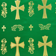 Gold crosses and decorative elements on a green background