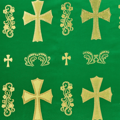 Gold crosses and decorative elements on a green background