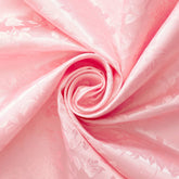 Close-up of pink fabric with a subtle pattern |Sold By BeautifulWindowsElgin.com