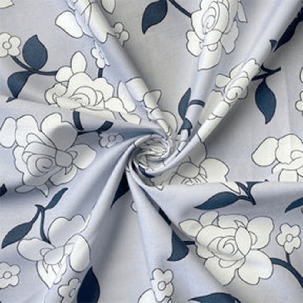 Rosette light blue floral cotton fabric sold by Beautiful Windows Elgin
