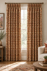 A close-up of a woven fabric texture with a small-scale checkered pattern in beige, rust red, and black.