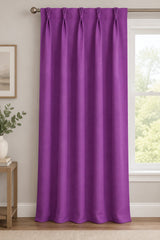A close-up of a solid purple textured fabric surface.