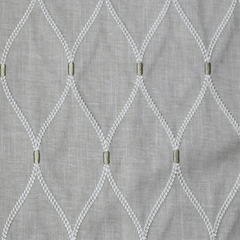 Textured drapery fabric with a geometric pattern in platinum & cream colors| Sold by beautifulwindowselgin.com