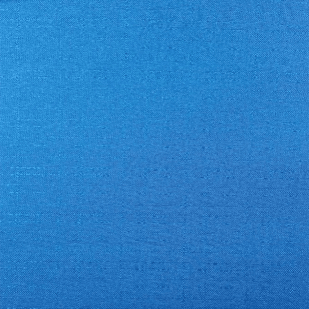 A solid blue colored curtain panel with a textured pattern| Beautiful Windows Elgin