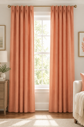 Close-up of a peach-colored fabric texture