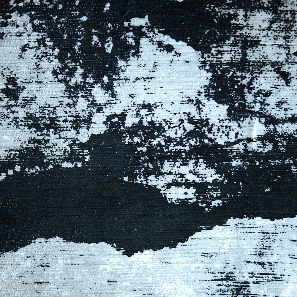 Close-up of a black and white patterned fabric with a visible texture, likely a tuxedo stripe design| Sold by Beautiful Windows Elgin
