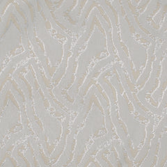 Mirabilia multi-purpose drapery fabric in ecru color with a small-scale geometric pattern.