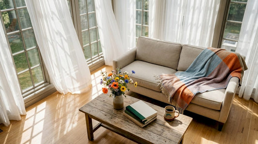 Sunlit living room with sheer fabric curtains