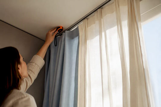 Ceiling-mounted curtain fabric falling to floor