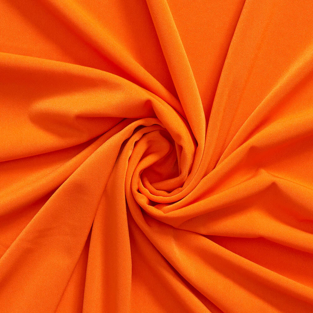ITY Knit Jersey—Clothing Fabric—Orange—90% Polyester, 10% Spandex—Available by the Yard—Width 58/60"—USA Shipping.