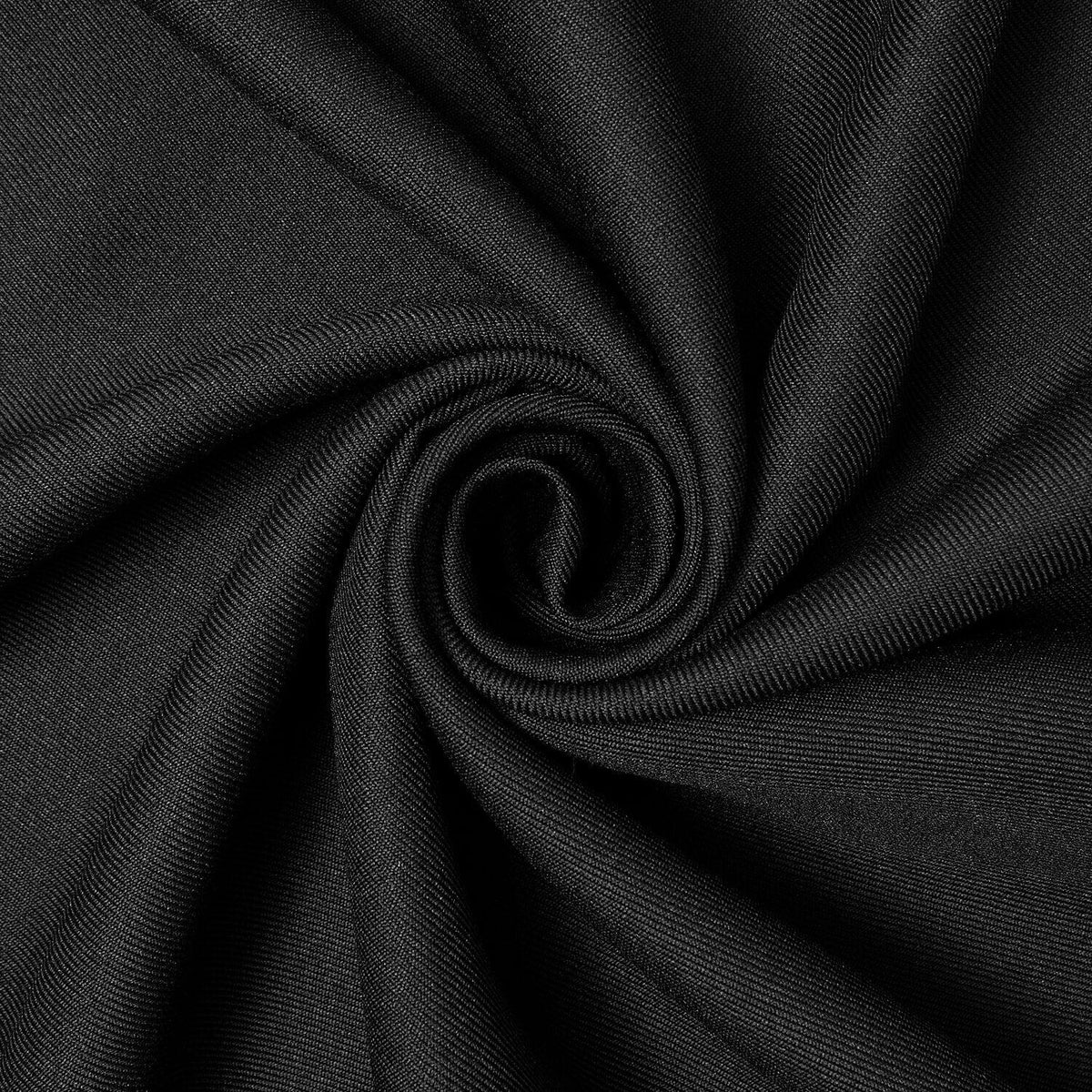 Close-up of black fabric with visible stitching and texture.