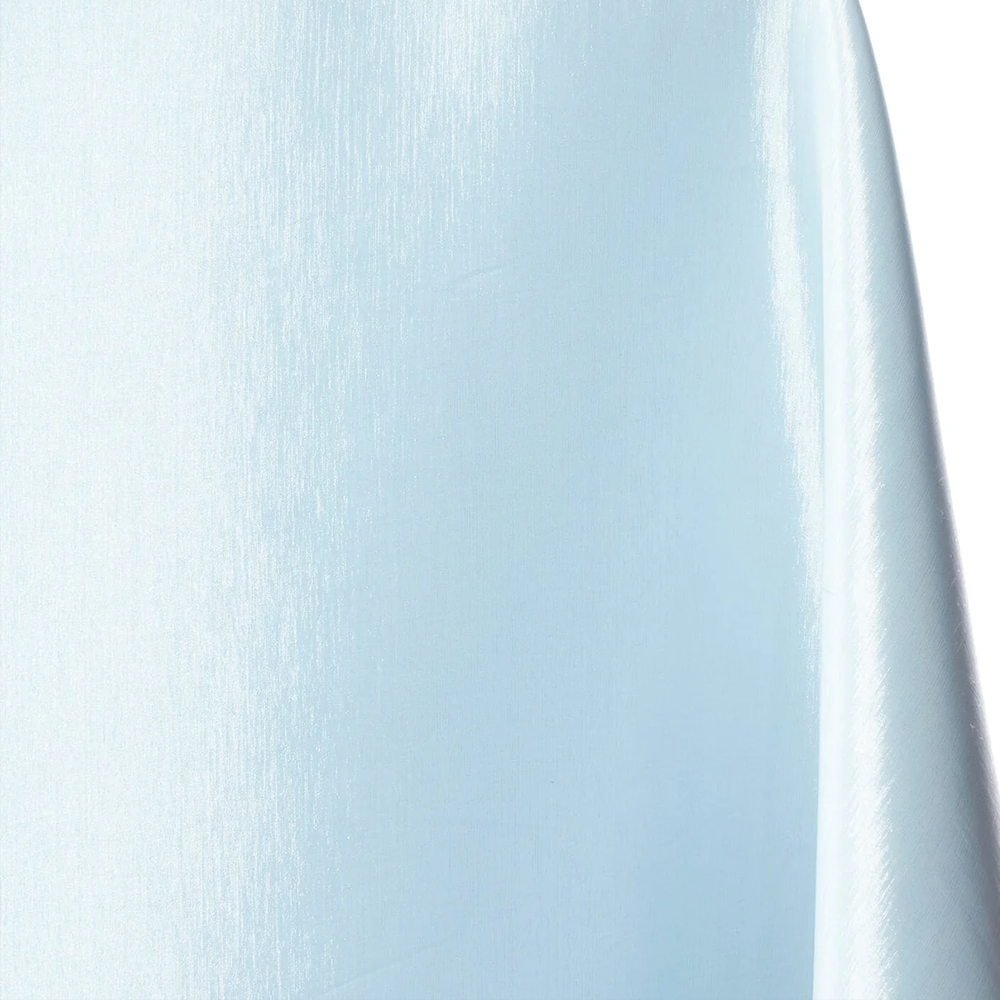 Close-up of a white curtain against a light blue background | Sold by Beautiful Windows Elgin