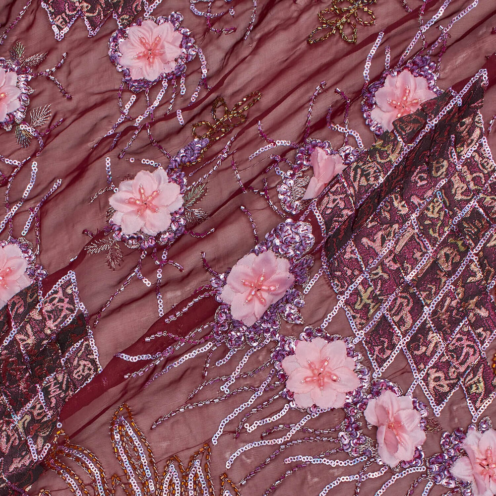 Close-up of burgundy floral beaded georgette lace fabric with sequins.
