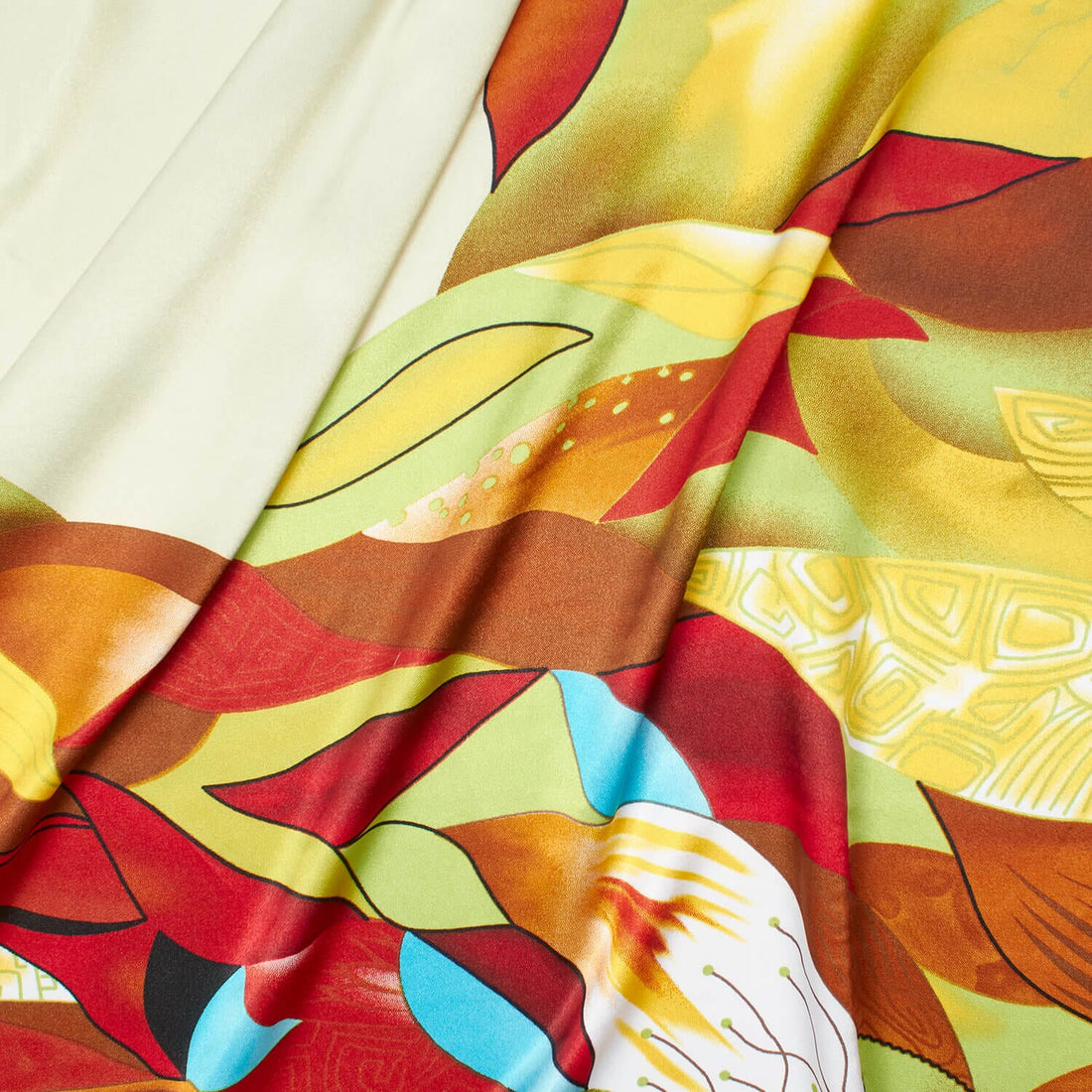 LEAF W/ GEOMETRIC SHAPES ON PRINTED MATERIAL