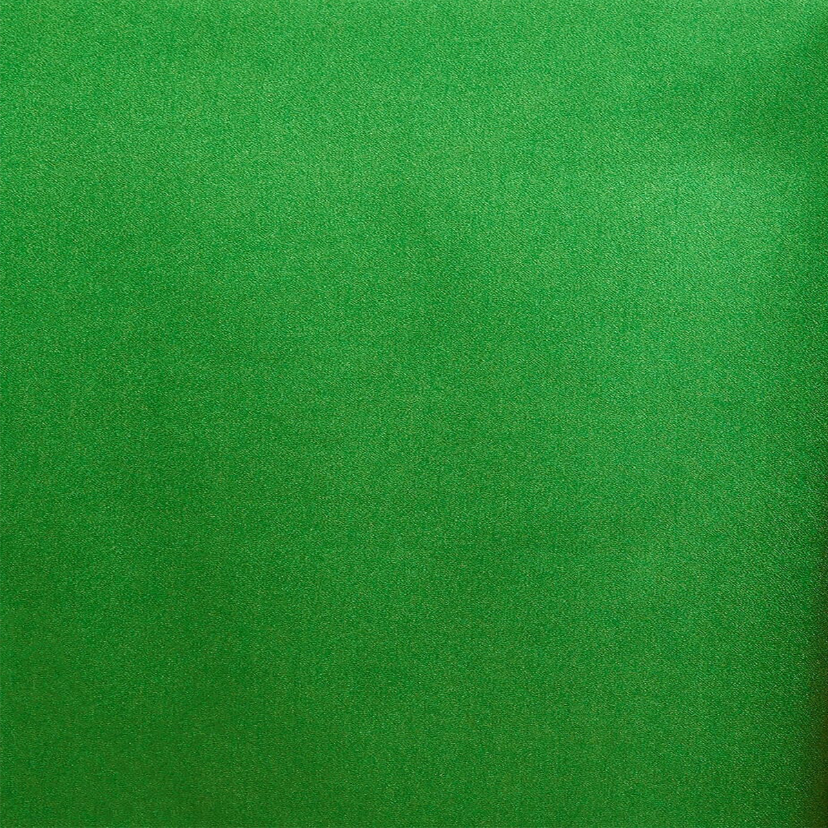A close-up image of kelly green crepe back satin fabric showing its texture and sheen.