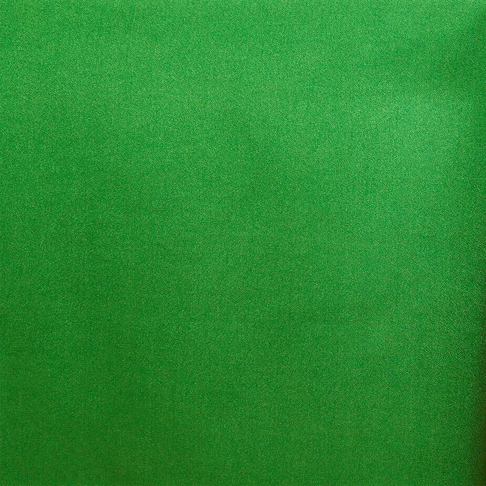 A close-up image of kelly green crepe back satin fabric showing its texture and sheen.