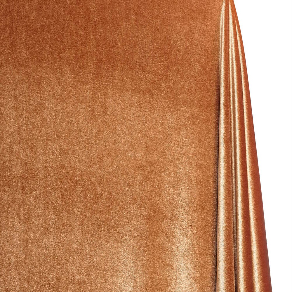 Close-up of brown fabric with a subtle texture on a white background