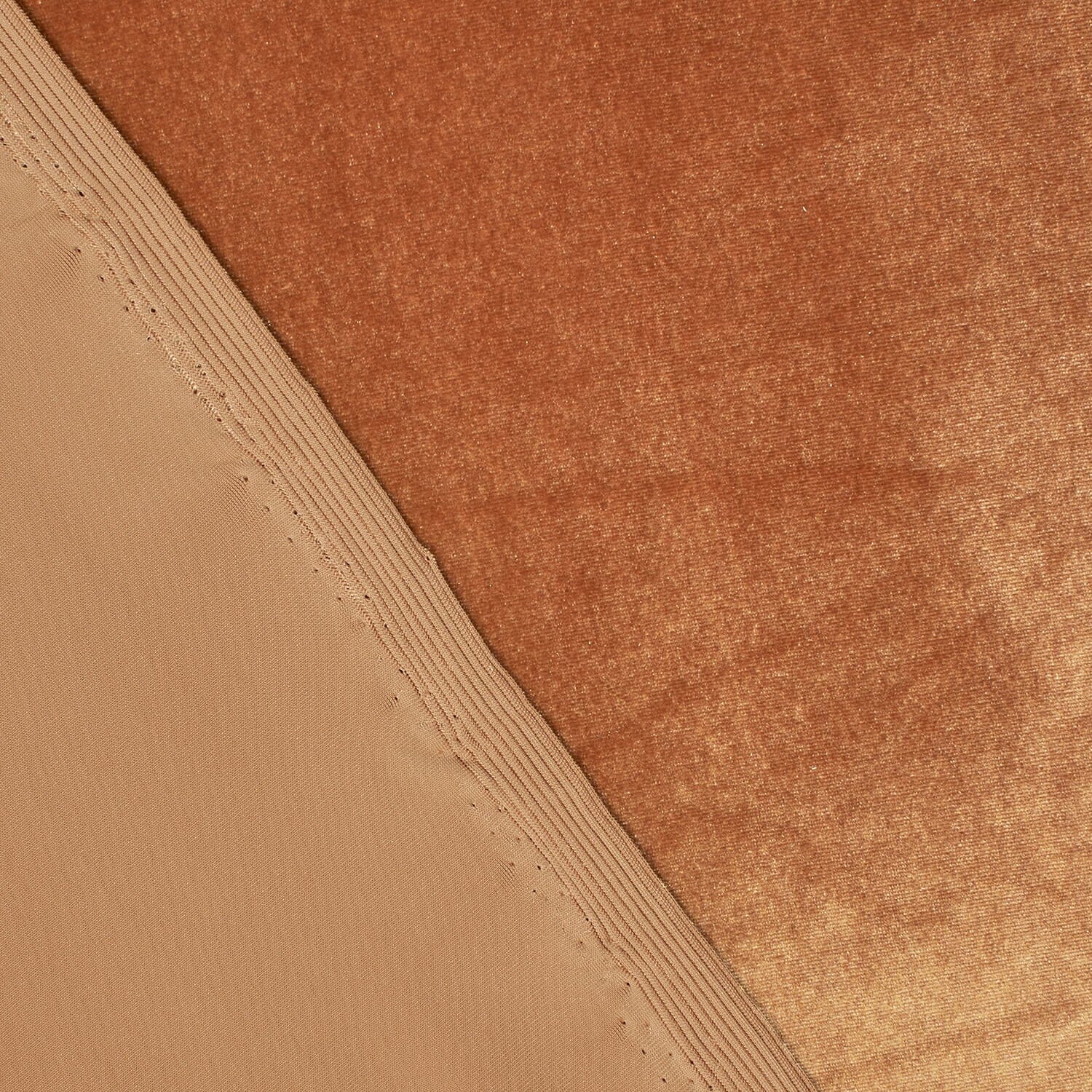 Close-up of brown fabric with a textured pattern