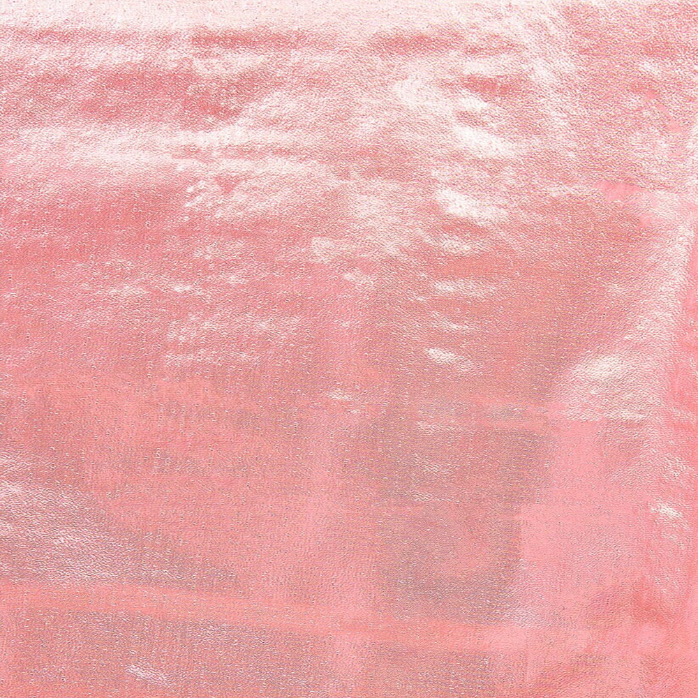 Close-up of a pink metallic fabric with a subtle textured pattern, reflecting light.