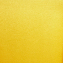 A swatch of neon yellow crepe back satin fabric| Beautiful Windows lgin