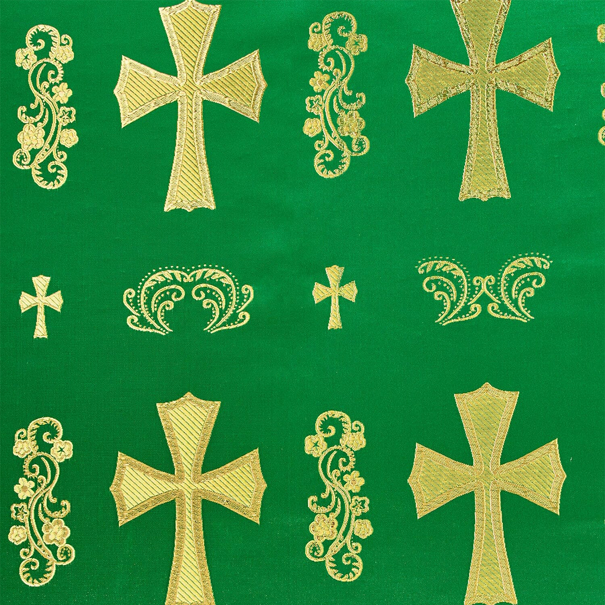 Gold crosses and decorative elements on a green background