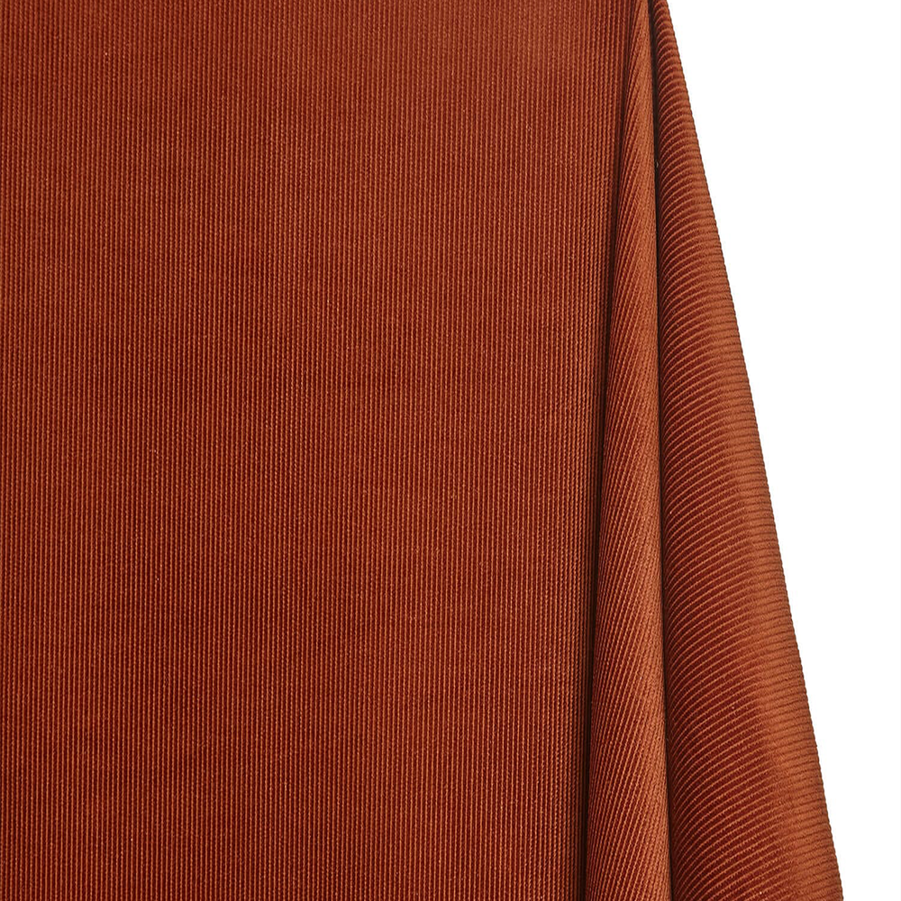 Close-up of brown fabric with a textured pattern