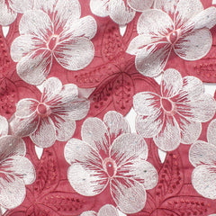 A piece of rose red fabric with white floral and leaf embroidery patterns| beautiful Windows Elgin
