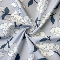 Rosette light blue floral cotton fabric sold by Beautiful Windows Elgin