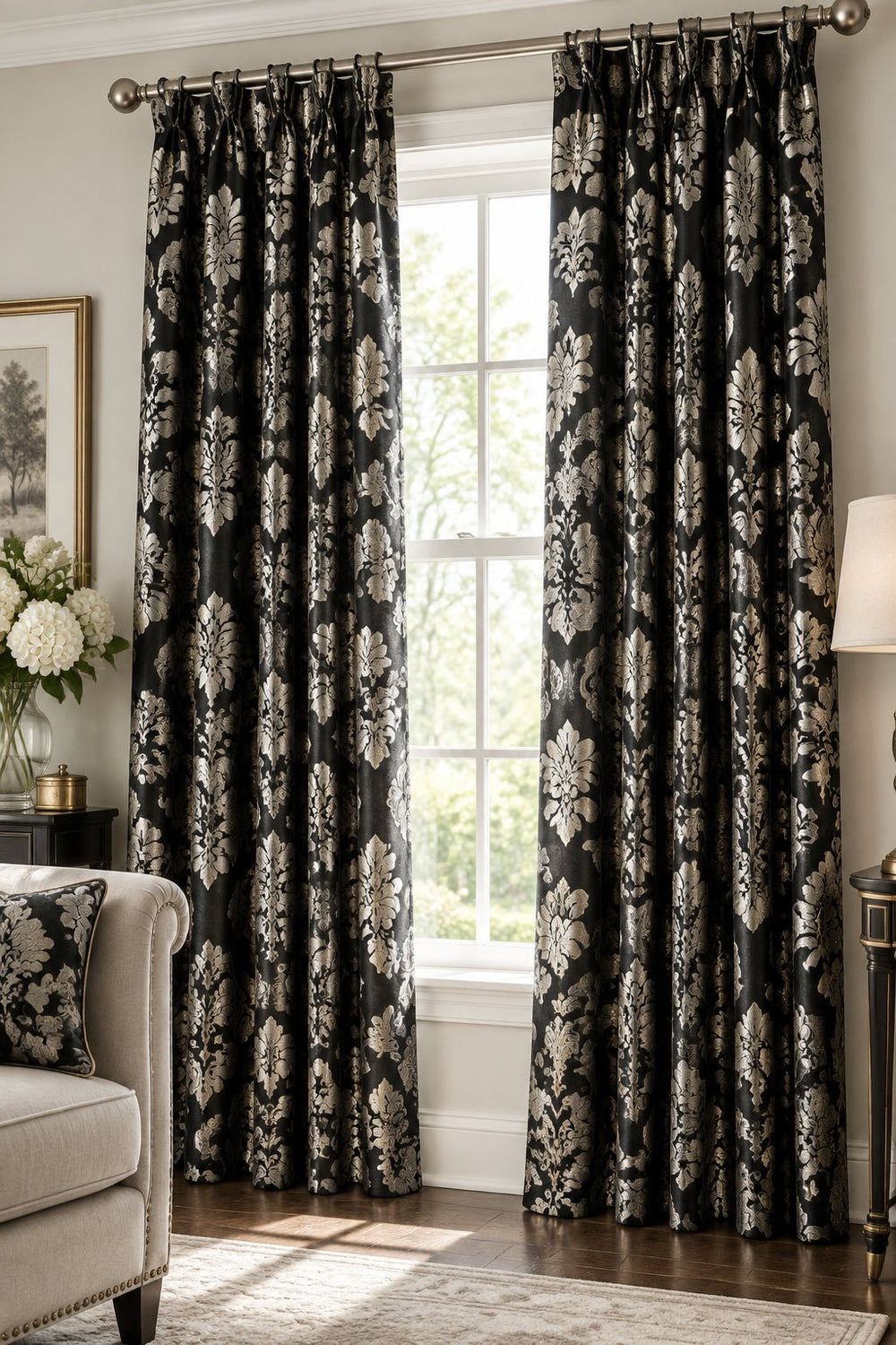 Decorative pattern with gold and white floral and scroll designs on a black background
