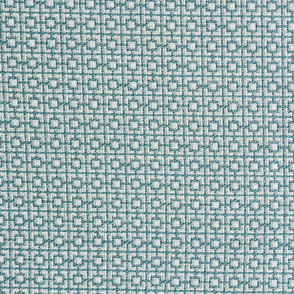 Close-up view of a light blue fabric with a small-scale geometric fretwork design.