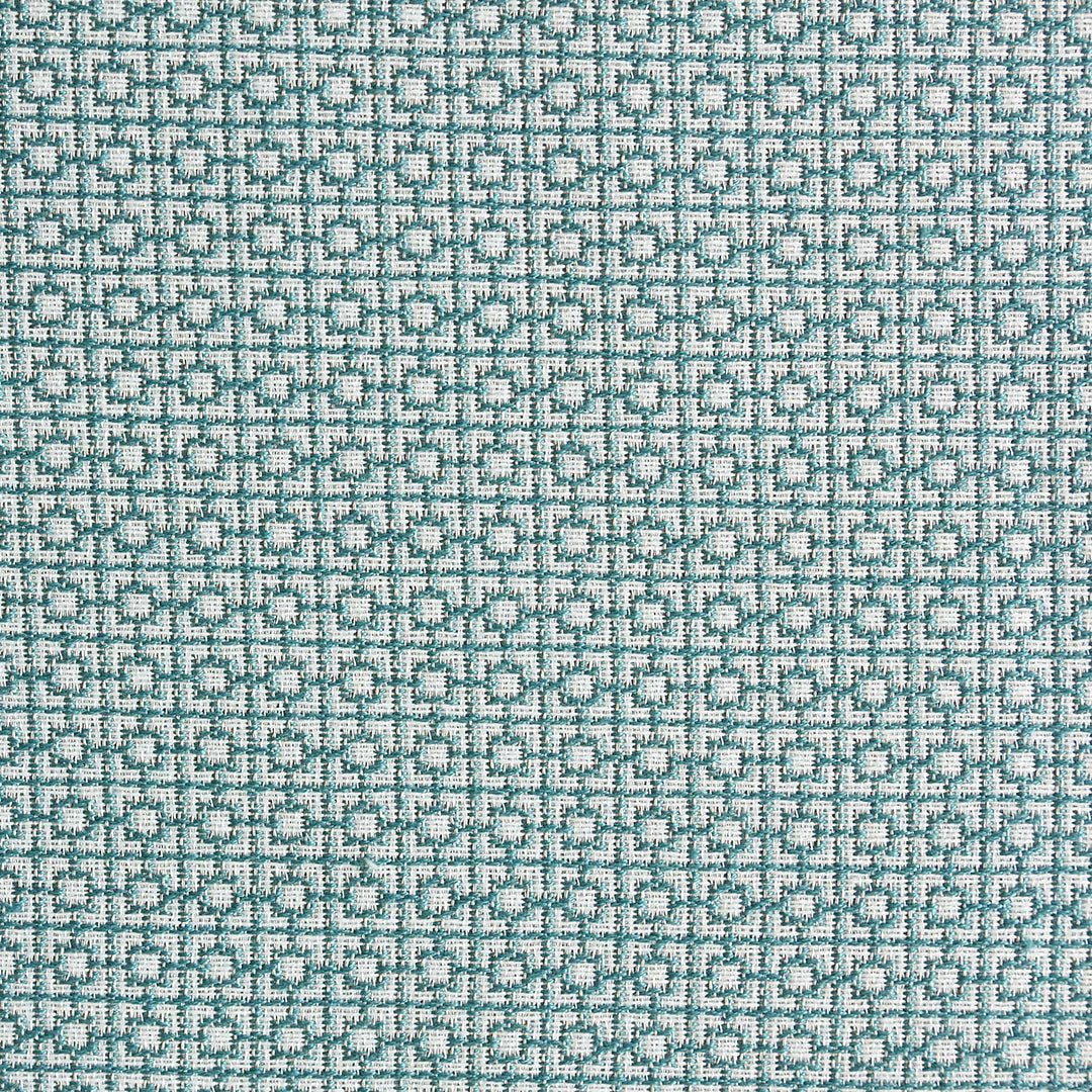 Close-up view of a light blue fabric with a small-scale geometric fretwork design.