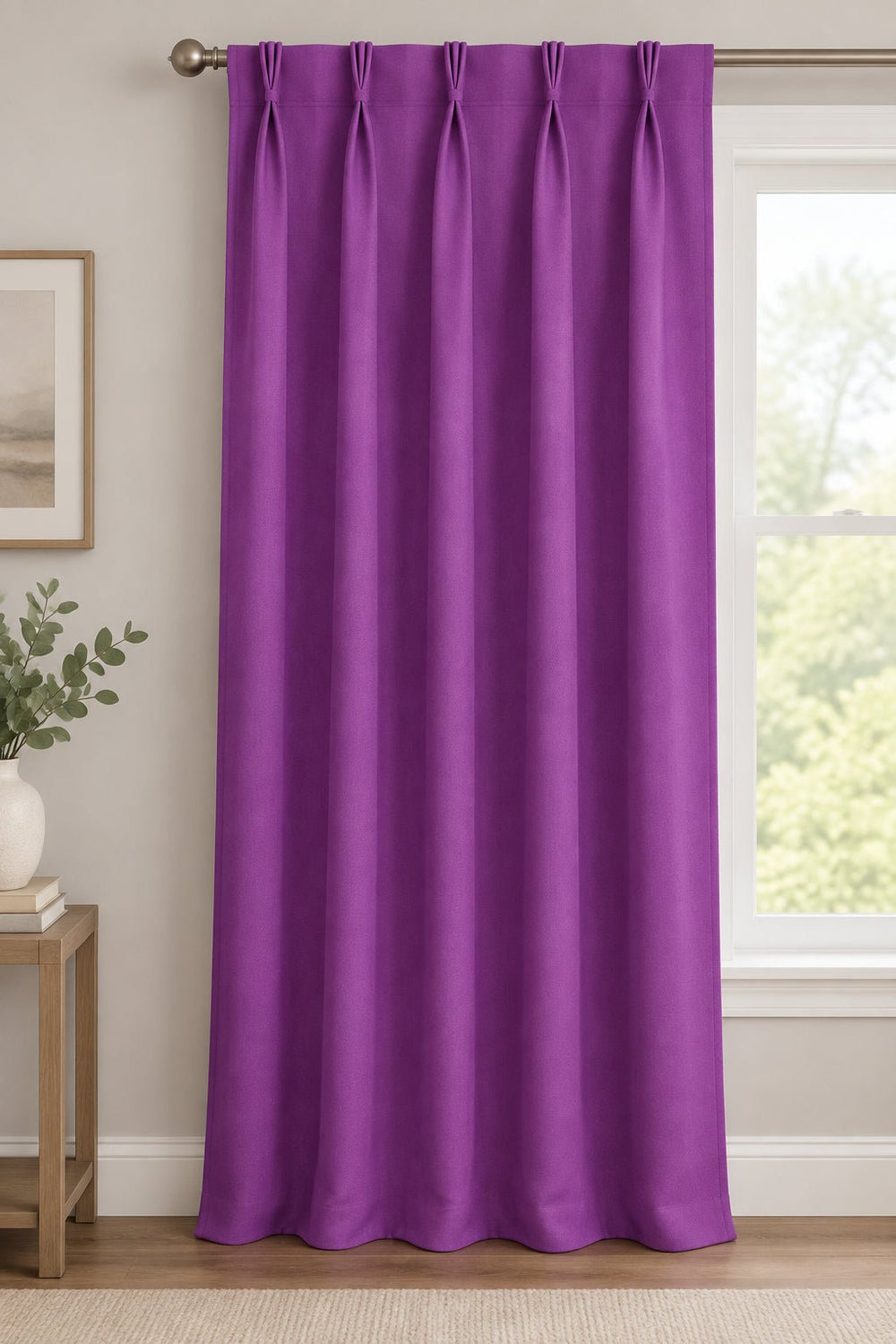 A close-up of a solid purple textured fabric surface.