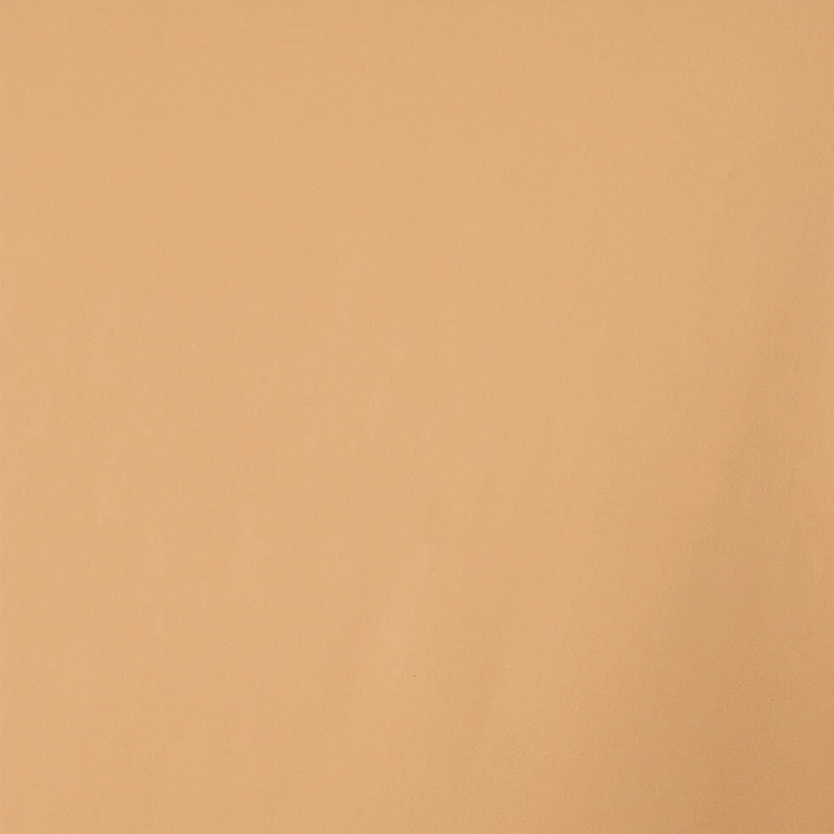 A swatch of nude-colored tricot fabric with a matte finish.