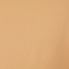 A swatch of nude-colored tricot fabric with a matte finish.