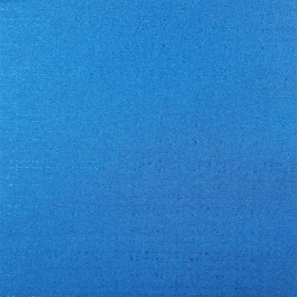 A solid blue colored curtain panel with a textured pattern| Beautiful Windows Elgin