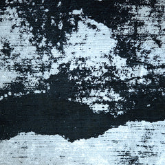 Close-up of a black and white patterned fabric with a visible texture, likely a tuxedo stripe design| Sold by Beautiful Windows Elgin