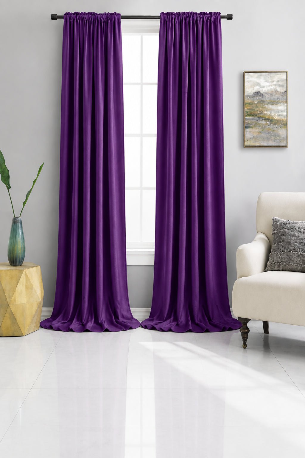 Royal Purple curtains hanging in a living room with a couch and side table.